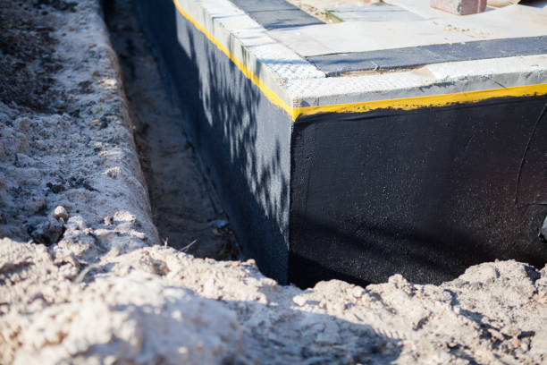 Professional Basement Waterproofing technician working in Penn Yan, NY